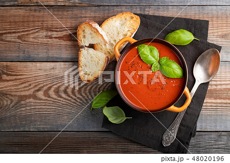 Homemade tomato soup with Basil. Homemade tomato soup with Basil. 48020196