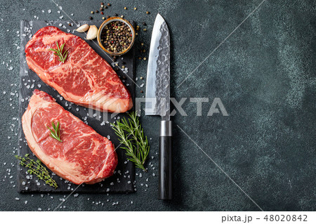 Fresh raw Prime Black Angus beef steaks. Fresh raw Prime Black Angus beef steaks. 48020842