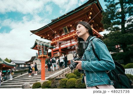 photographer taking picture in japanese lifestyle 48025736