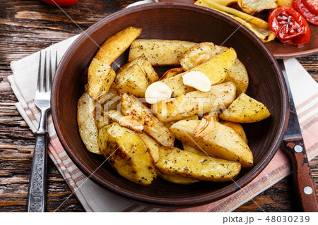 baked potato on a plate. Top view. 48030239