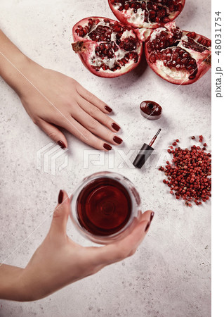 Girl paints her nails the gel Polish. 48031754