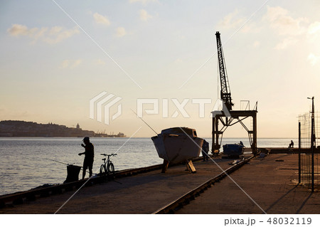 Lisbon old port at sunset 48032119