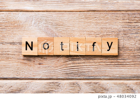 NOTIFY word written on wood block.  48034092