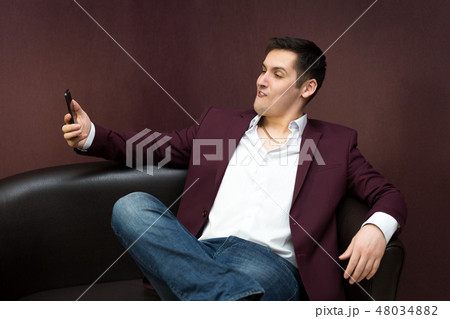 Young gypsies Baron with the phone. Young gypsies Baron with the phone. 48034882