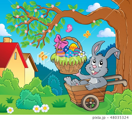 Easter bunny in wheelbarrow image 3 48035324