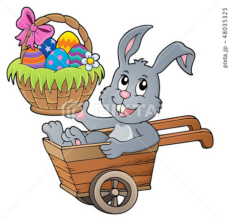 Easter bunny in wheelbarrow image 2 48035325