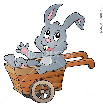 Easter bunny in wheelbarrow image 1 48035326