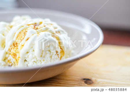 White cottage cheese with caramel White cottage cheese with caramel 48035884