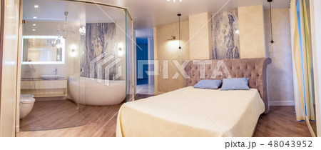 luxary apartment with bedroom and bathroom with glass walls luxary apartment with bedroom and bathroom with glass walls 48043952