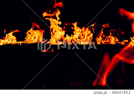 Fire flames on a black background Fire flames on a black background 48047852
