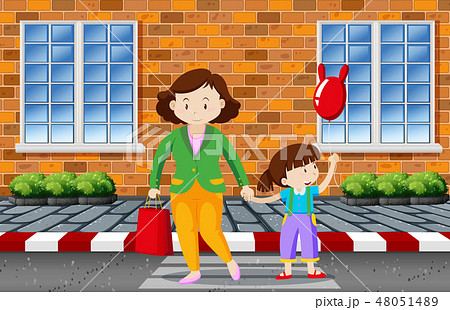 Mother and child crossing the road 48051489