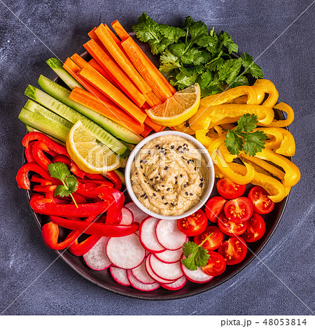 Homemade hummus with fresh vegetables. Homemade hummus with fresh vegetables. 48053814