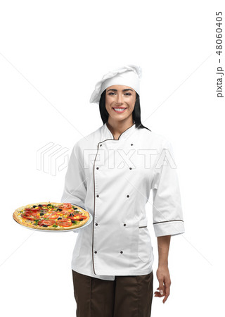 New chef of restaurant in working clothes with famous pizza. 48060405