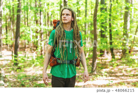 Happy male hiker with backpack Happy male hiker with backpack 48066215