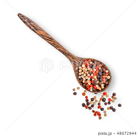 dried peppers in wood spoon isolated on white dried peppers in wood spoon isolated on white 48072944