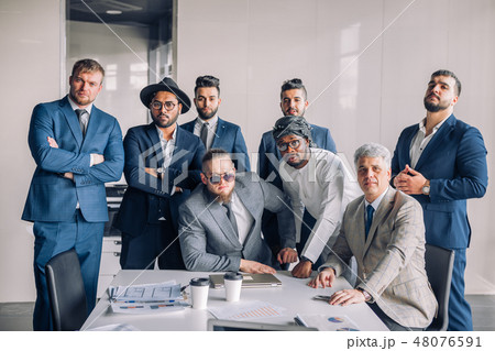 Multiracial group of business team consisting of men only with Executive indoor Multiracial group of business team consisting of men only with Executive indoor 48076591