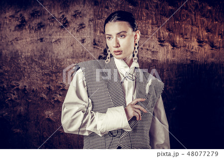 Beautiful nice young woman wearing stylish clothes Beautiful nice young woman wearing stylish clothes 48077279