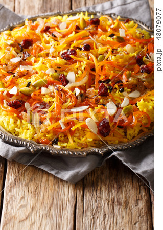 Iranian jeweled rice with dried fruits, carrots 48079077