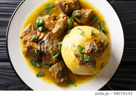 Mofongo made of plantain and chicharron Mofongo made of plantain and chicharron 48079142