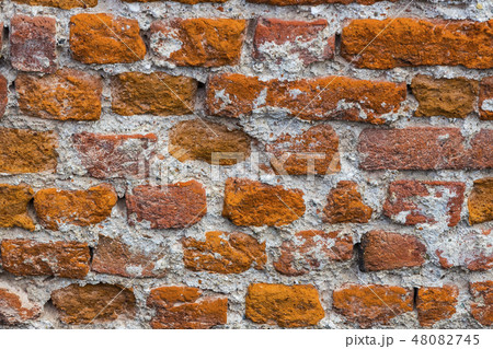 Background of an old stone brick wall shot close-u 48082745