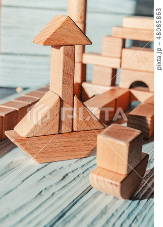 Children's wooden designer from blocks of a different form 48085863