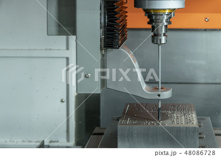The CNC gun drill machine drilling hole . The CNC gun drill machine drilling hole . 48086728