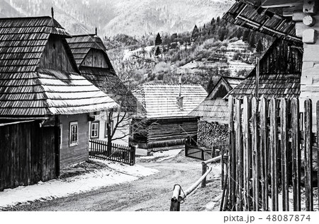 Colorful wooden houses in Vlkolinec, colorless Colorful wooden houses in Vlkolinec, colorless 48087874