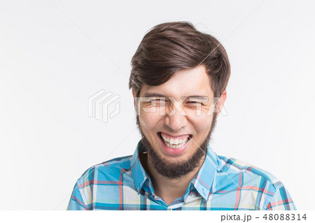 Expression and gesture concept - Close up portrait of laughing man 48088314