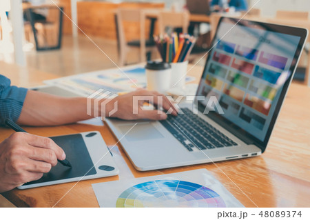 Young creative graphic designer working on project architectural Young creative graphic designer working on project architectural 48089374