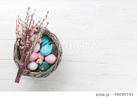 Easter eggs in basket 48090593