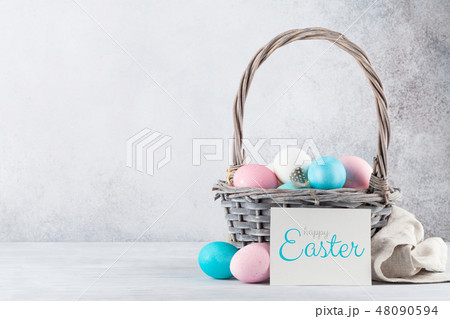 Easter eggs in basket 48090594
