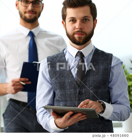 Group of smiling bearded clerk men at workplace 48091660