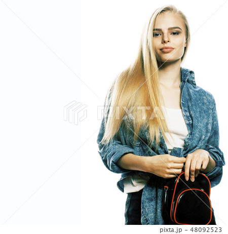 young blond woman on white backgroung gesture thumbs up, isolated emotional posing close up 48092523