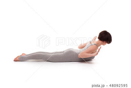 young beautiful woman yoga posing. isolated 48092595