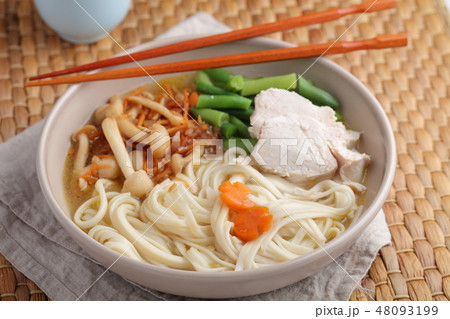 Chicken and udon noodle soup with Shimeji mushroom 48093199