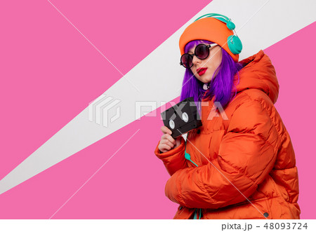 girl with purple hair with headphones and VHS 48093724