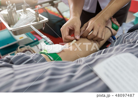 Nurse receiving blood from blood donor in hospital Nurse receiving blood from blood donor in hospital 48097487