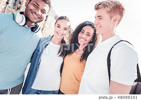 Cheerful young people having pause 48099101