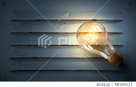 Light bulb on metal surface Light bulb on metal surface 48104121