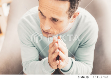 Sad grey-eyed man feeling terrible after divorce 48105208