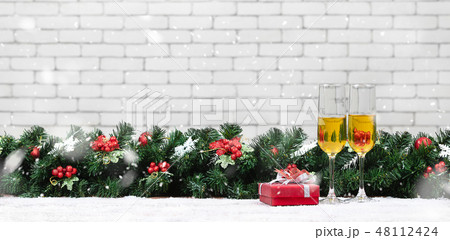 Two champagne glasses Two champagne glasses 48112424