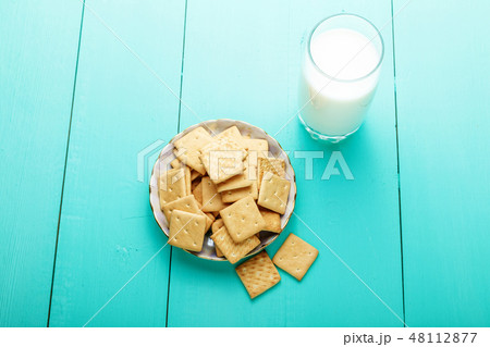 healthy breakfast glass of milk and crackers 48112877