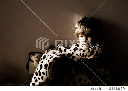 child boy wrapped in a blanket. child boy wrapped in a blanket. 48118090