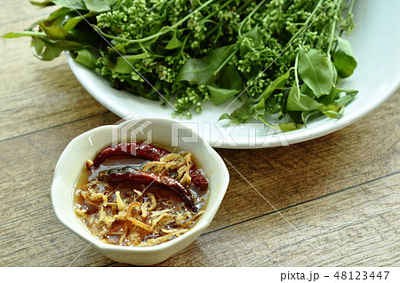 Siamese neem tree dipping with sweet fish sauce Siamese neem tree dipping with sweet fish sauce 48123447