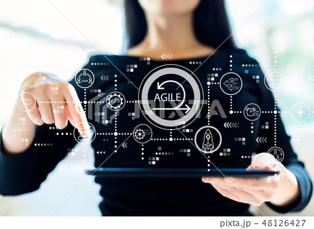 Agile concept with woman using tablet Agile concept with woman using tablet 48126427