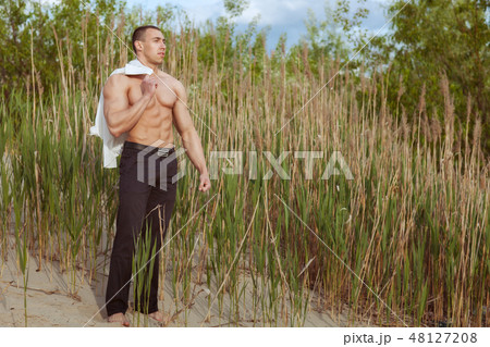 Young macho man. 48127208