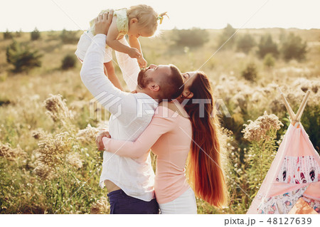Family have fun in a park 48127639