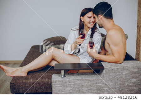Cute couple at home Cute couple at home 48128216