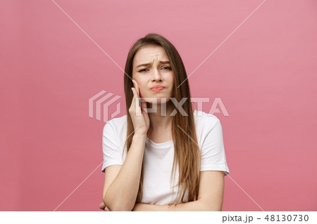 Young caucasian woman over isolated background touching mouth with hand with painful expression 48130730