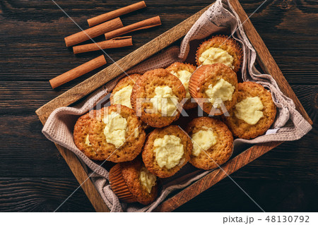 Pumpkin muffins with cream cheese stuffing. Pumpkin muffins with cream cheese stuffing. 48130792